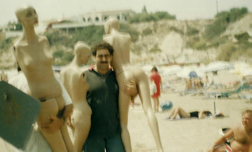 The artist installing Mannequins at the beach