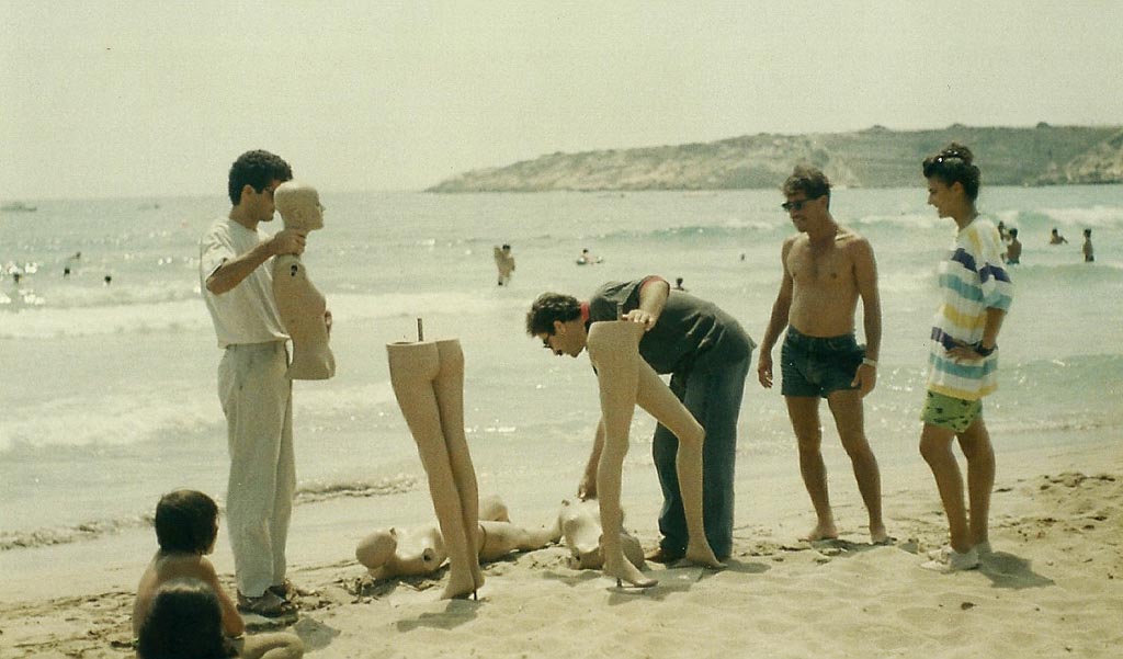 The artist installing Mannequins at the beach