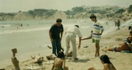 The artist installing Mannequins at the beach