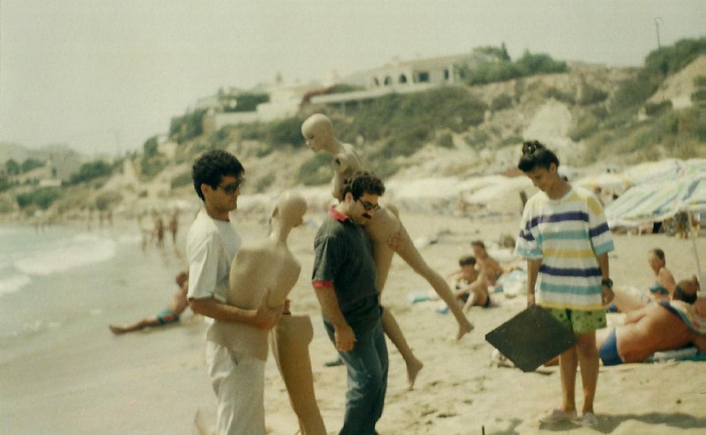 The artist installing Mannequins at the beach