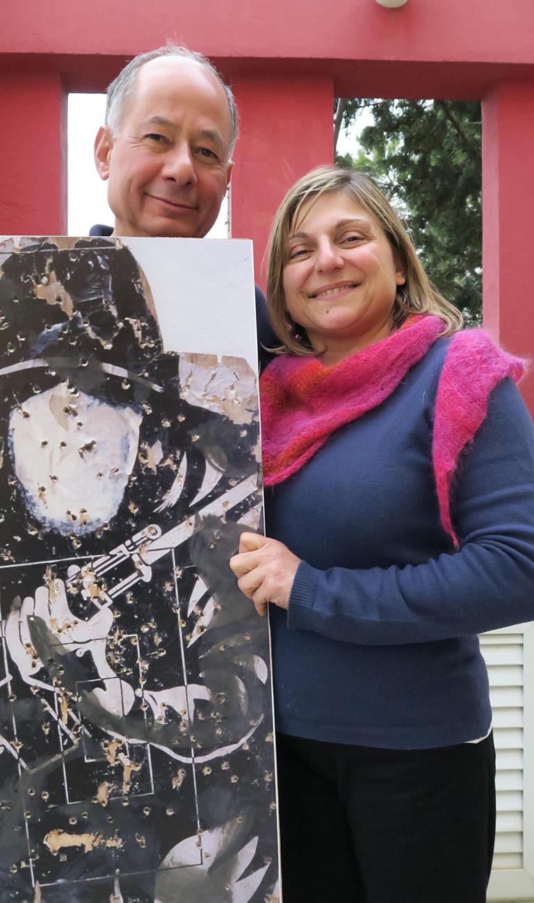 A couple holding a target