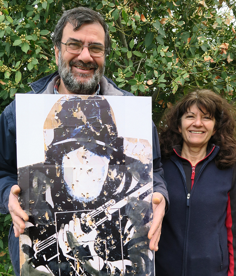 A couple holding a target