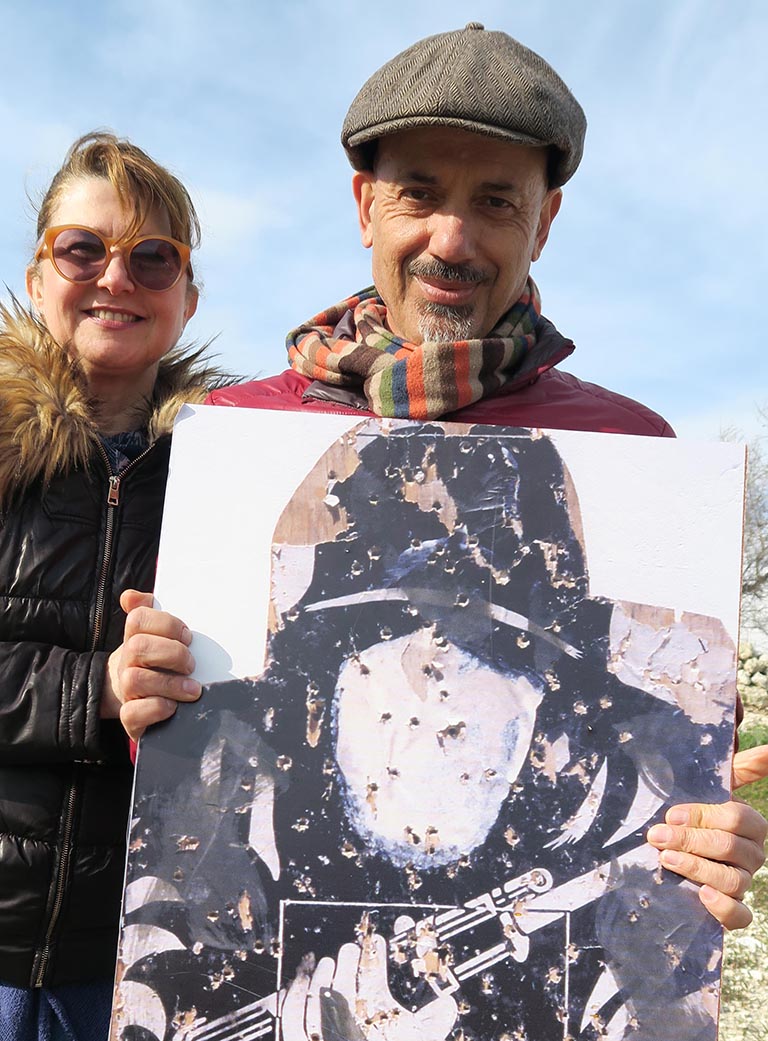 A couple holding a target